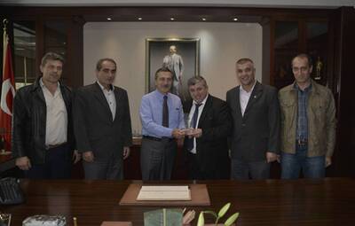 KRİSTAL-İŞ SENDİKASI'NDAN ATAÇ'A PLAKET