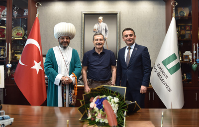 DÖKMECİ'DEN BAŞKAN ATAÇ'A ZİYARET